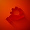 Paper cut Hand settings gear icon isolated on red background. Adjusting, service, maintenance, repair, fixing. Paper art