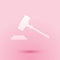 Paper cut Judge gavel icon isolated on pink background. Gavel for adjudication of sentences and bills, court, justice
