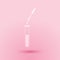 Paper cut Laboratory pipette with liquid and falling droplet over test tube icon isolated on pink background. Laboratory