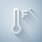 Paper cut Meteorology thermometer measuring heat and cold icon isolated on grey background. Temperature Fahrenheit