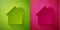 Paper cut Nursing home building icon isolated on green and pink background. Health care for old and sick people. Center