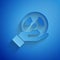 Paper cut Radioactive in hand icon isolated on blue background. Radioactive toxic symbol. Radiation Hazard sign. Paper