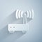 Paper cut Router and wi-fi signal icon isolated on grey background. Wireless ethernet modem router. Computer technology