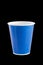 Paper disposable cup for drinks on a black background. Isolated. Drinks, fast food concept