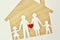 Paper family cut-out and house - Love and family union concept