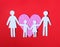 Paper Family in Pink Heart over on red background. Love, Kids