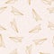 Paper gold planes and gold celestial elements in a seamless pattern design