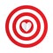 Paper heart in the center of darts target aim.