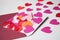 Paper heart falling from envelope on white background - valentine`s day concept