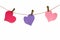 Paper hearts and clothespins on string