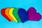 Paper hearts in lgbt colors top view. Pride theme