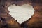 Paper hearts on a wooden board. Valentines day, Wedding day. Empty heart, free space for your love text