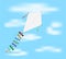 Paper kite flying on blue sky