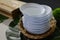 Paper plates made from betel leaf husks are biodegradable, use once and throw away.