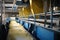 A paper production line at a waste paper recycling factory. Pulp and paper mill