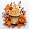 Paper quilling 3D style fall scene with leaves and a cupcake or pumpkin spiced latte.
