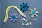 Paper quilling Christmas Crafts in the form of snowflakes from s