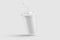 Paper soda cup with straw mockup template, isolated on light grey background.