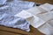 Paper tissue and a cotton handkerchief. Coronavirus advice includes use a disposable paper tissue instead of a cotton one