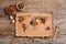 Paper with world map made of different aromatic spices on wooden background