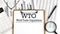 Paper with WTO - World Trade Organization table on charts, business concept