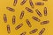 Paperclips stationery abstract on yellow background