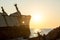 Paphos, Cyprus - Feb 18 2020: tourists taking photos near edro 3 shipwreck, near paphos cyprus at sunset