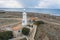 Paphos Lighthouse, Cyprus, aerial view from drone. Located in Paphos archeological park on mediterranean seaside or