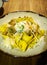 Pappardelle ai Funghi plating with a Poached Egg