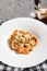 Pappardelle pasta with salmon and sauce bisque