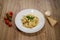 Pappardelle pasta with white cheese sauce and ham