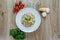 Pappardelle prosciutto e funghi pasta with wild garlic to garnish top