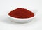 Paprika Powder, capsicum annuum, Spice against White Background