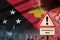 Papua New Guinea flag and Coronavirus 2019-nCoV alert sign. Concept of high probability of novel coronavirus outbreak through