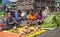 Papuans woman sell sweet potatoes and other vegetables