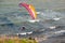 Para gliders fly along the steep coast of the Baltic Sea