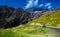 Para sailing beside hilly highway with green pasture and blue sky on the way to himalaya from the road,manali tourism Himachal leh