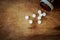 Paracetamol on the old wooden floor