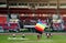 Parachute display team performs before cricket festival at Isa Town, Bahr