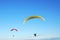 Parachute flying in sky