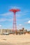 Parachute Jump at Luna Park, Coney Island with empty Beach in front during sunny winter day, NYC