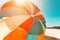 Parachute parasailing of tourists on a sandy beach Sunny weather against the background of clear sea and ocean.The wind blows up