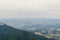 Parachute skydiver flying in clouds at top of mountains with ama