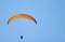 Parachuter in sky