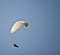 Parachuter in sky