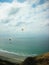 Parachutes Over Beach Mountains