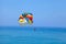 Parachuting over a blue sea