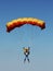 Parachutist against sky
