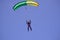 Parachutist in air