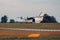 Parachutist aircraft on land